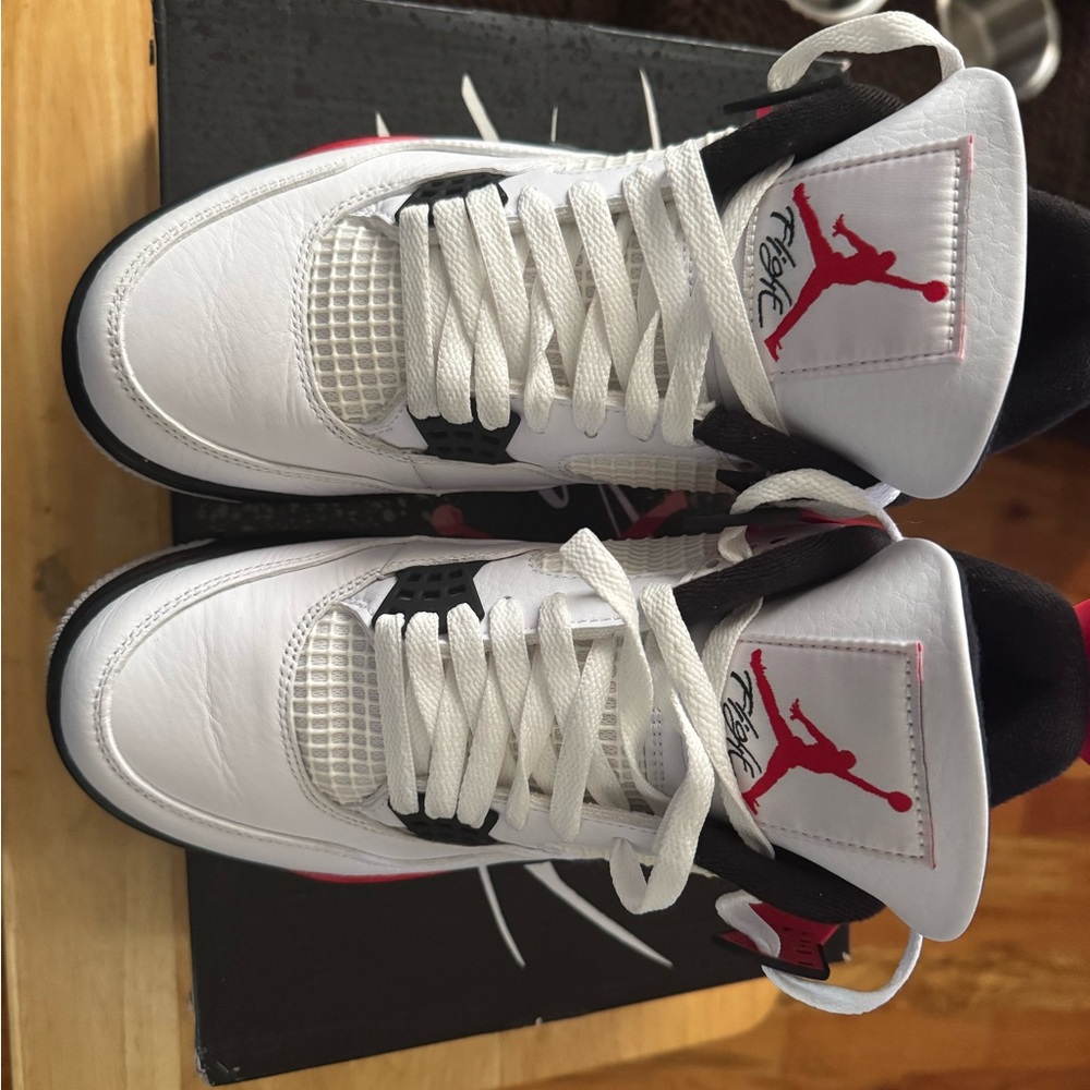 Jordan Air 4 Retro in White, Red, and Black